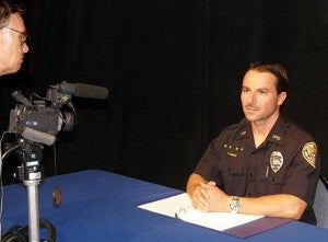 Link to show image of Officer Patrick Menino taping an episode of Hawaii Island's Most Wanted Image of Officer Menino on the set of Hawaii Islands Most Wanted.