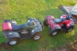 two ATVs on grass