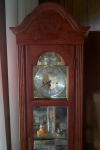 wood and glass grandfather clock