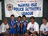 Photo: Menehune Warriors with banner