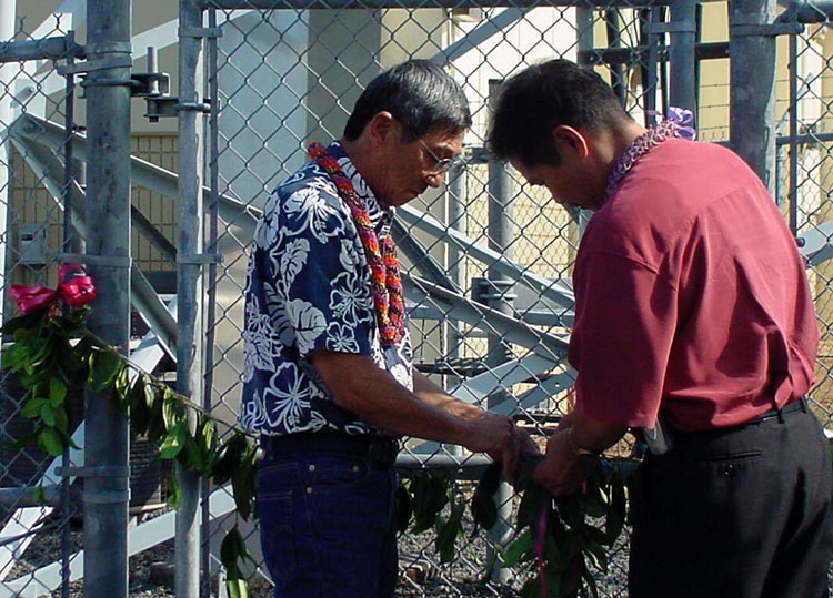 Untying Maile Lei