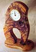Image: wood carving with clock face