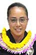 Head-and-shoulders photo of Officer Akina in uniform with lei