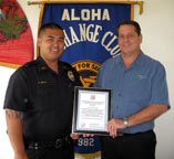 Image: Bello and Gutierrez pose with certificate.