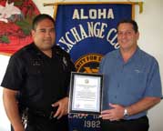 Image: Fojas and Gutierrez pose with certificate.